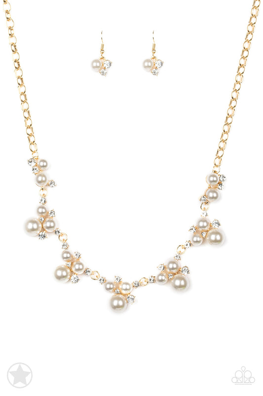 Toast To Perfection - Gold chain, the sections of luminescent frames trickle along the neck