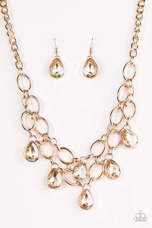 Show-Stopping Shimmer Gold Short Necklace Paparazzi Accessories Blockbuster. #P2RE-GDXX-134XX