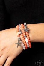 Load image into Gallery viewer, Paparazzi Ocean Breeze Orange $5 Bracelet. Get Free Shipping. #P9WH-OGXX-101XX. Sea Shell Starfish
