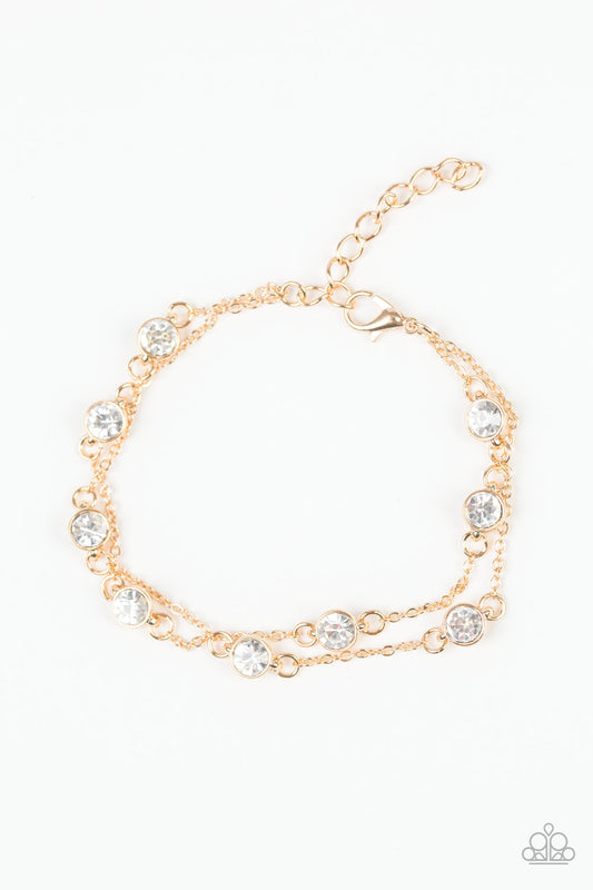 Paparazzi Spotlight Starlight Gold Bracelet with clasp closure. Shop at AainaasTreasureBox