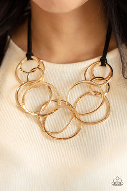 Spiraling Out of COUTURE Gold Necklace Paparazzi Accessories. Get Free Shipping. #P2ST-GDXX-121XX