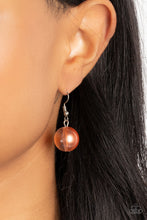 Load image into Gallery viewer, Marina Mirage Orange Necklace Paparazzi $5 Jewelry. Pearly coral shimmer, glassy translucent 
