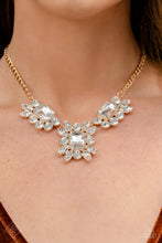 Load image into Gallery viewer, March 2023 Paparazzi Fashion Fix Necklace: &quot;Exaggerated Elegance - Gold&quot; (P2RE-GDXX-464NV)
