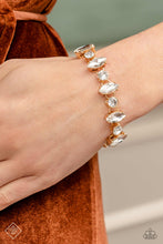 Load image into Gallery viewer, March 2023 Paparazzi Fashion Fix Bracelet: &quot;​Exclusively Extravagant - Gold&quot; (P9RE-GDXX-392NV). Free
