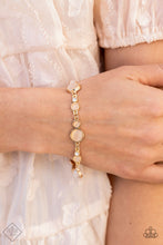 Load image into Gallery viewer, Paparazzi Storybook Beam Gold Bracelet. June 2021 Fashion Fix Bracelet. #P9RE-GDXX-325AW.

